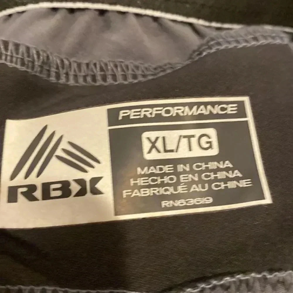 - RBX Active Men's  Stretch Woven  short